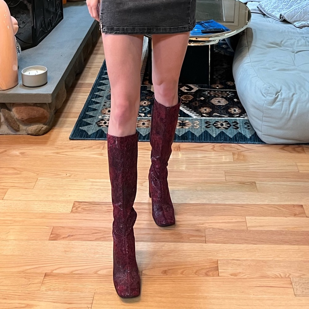 Epic snake skin knee high boots